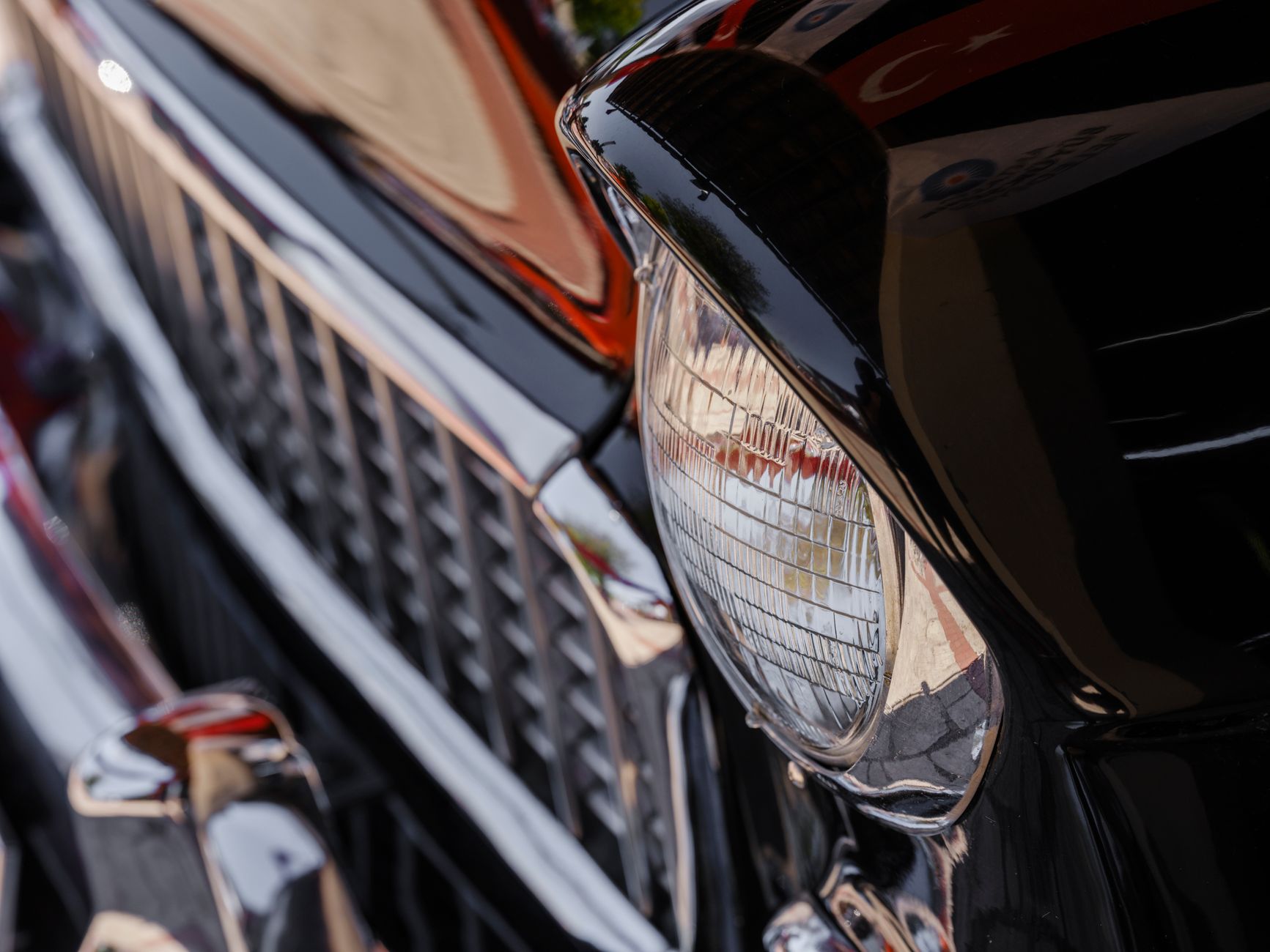 Vintage car chrome headlight close-up